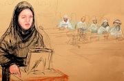 Cheryl Bormann, left, who represents Walid bin Attash, an alleged 9/11 plot deputy, addresses military commission at Guantanamo Bay Naval Base dressed in a hijab.