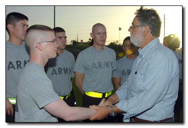 Gordon Haberman, who lost his daughter at the World Trade Center on Sept. 11, 2001, talked about his daughter to the soldiers of the 189th Military Police Co. at U.S. Naval Station Guantanamo Bay, July 15, 2009, and thanked them for their service to Joint Task Force Guantanamo. Haberman was part of a group of Sept. 11, 2001, victim family members who asked to meet the JTF guards – just to say, “thank you” -- when the group was here for the recent military commissions proceedings.